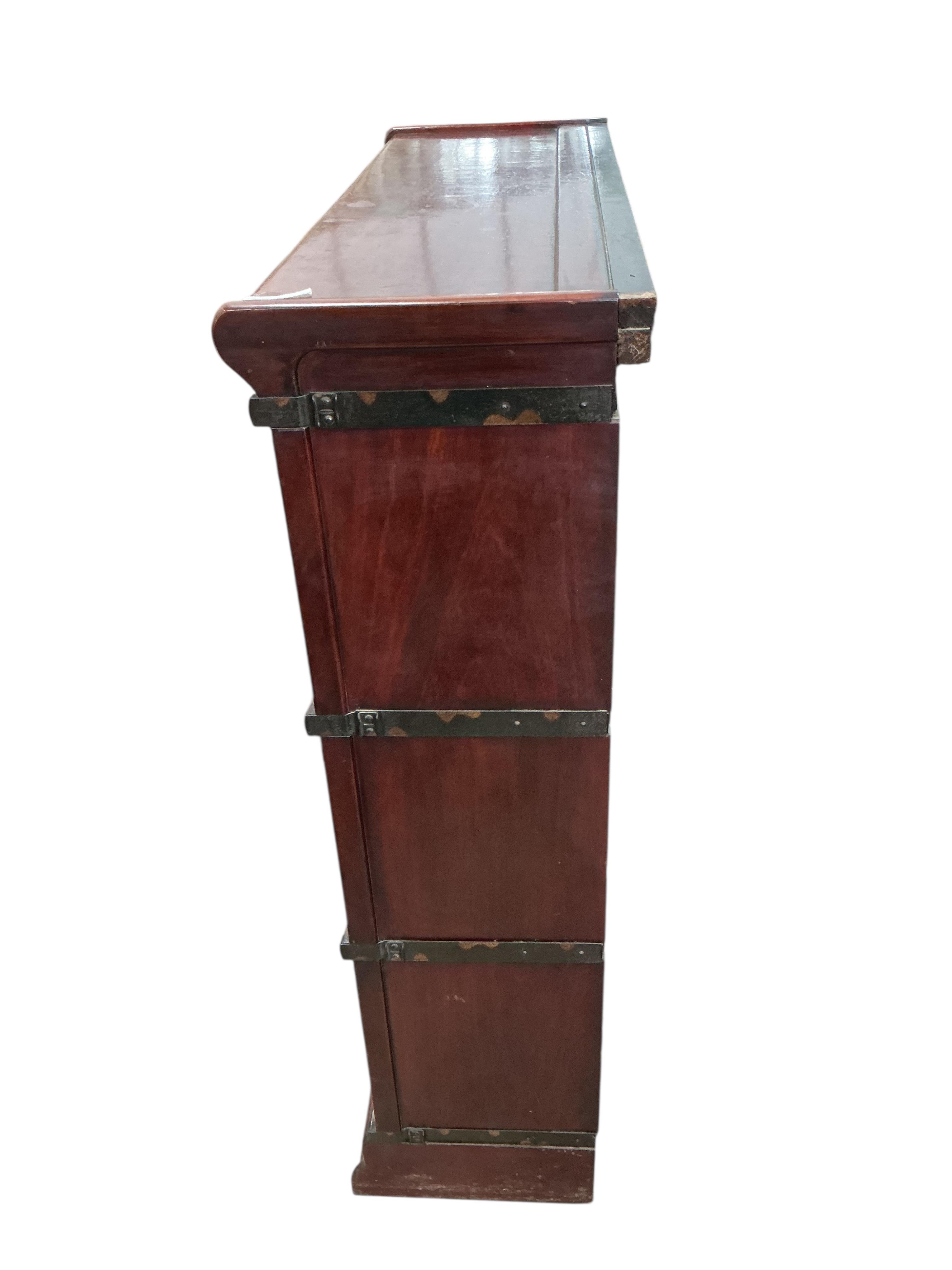 A Globe Wernicke mahogany three section bookcase, width 86cm, depth 29cm, height 102cm